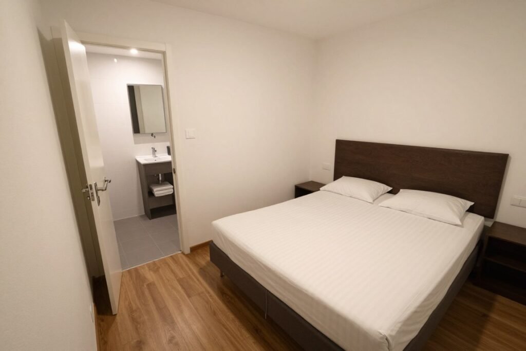 Small European hotel room showing typical space constraints