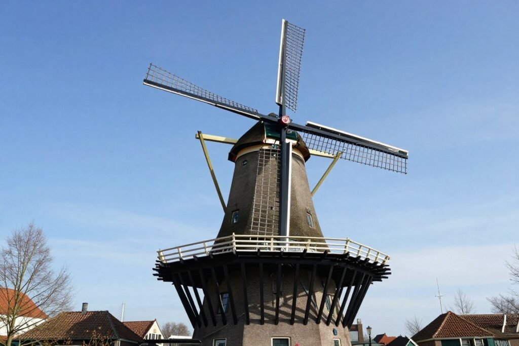 Things to Do in Leiden Netherlands 7 Windmill Museum De Valk in Leiden against blue sky